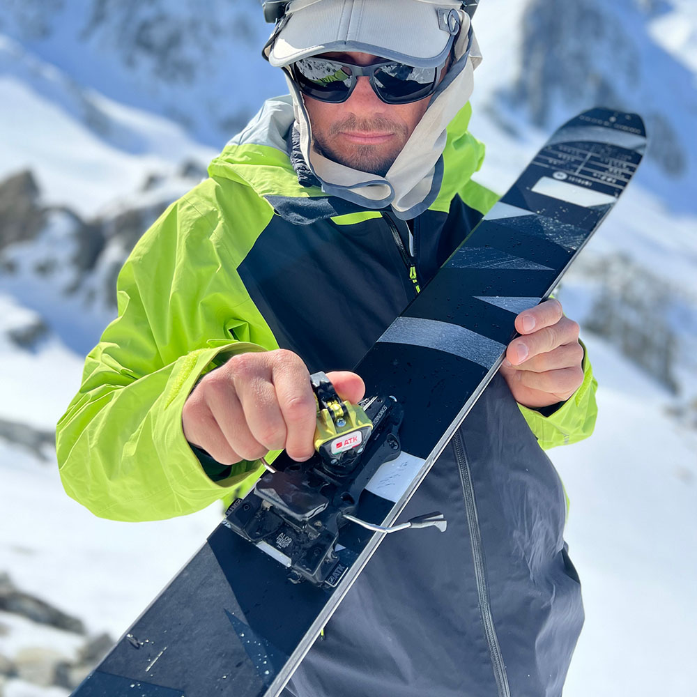 Jim Young checking ski bindings